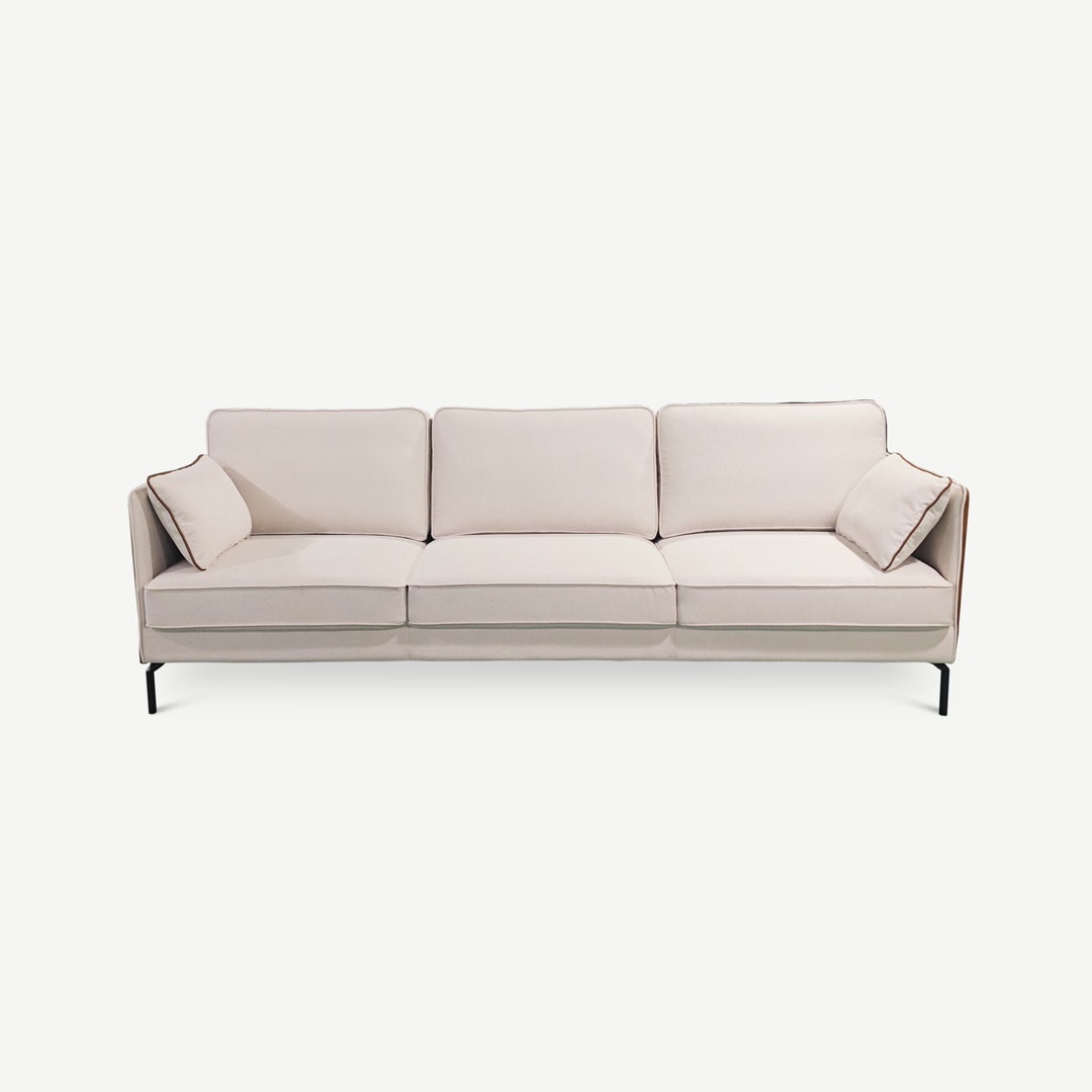 Beige two deals seater sofa