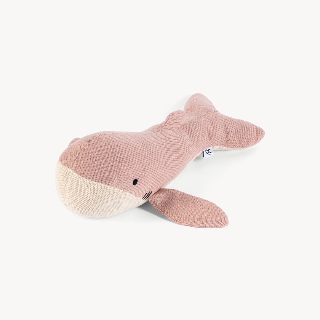 وسادة دلفينو محبوكة وردية باهتة